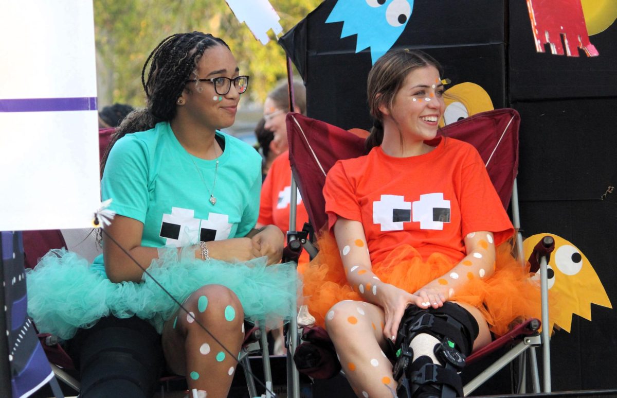 INKY AND CLYDE. Dressed as the ghost from Ms. Pac-Man, freshmen Stasia Marchant and Na'Meiah Padilla. Even while being injured, they participated in the homecoming festivities. 