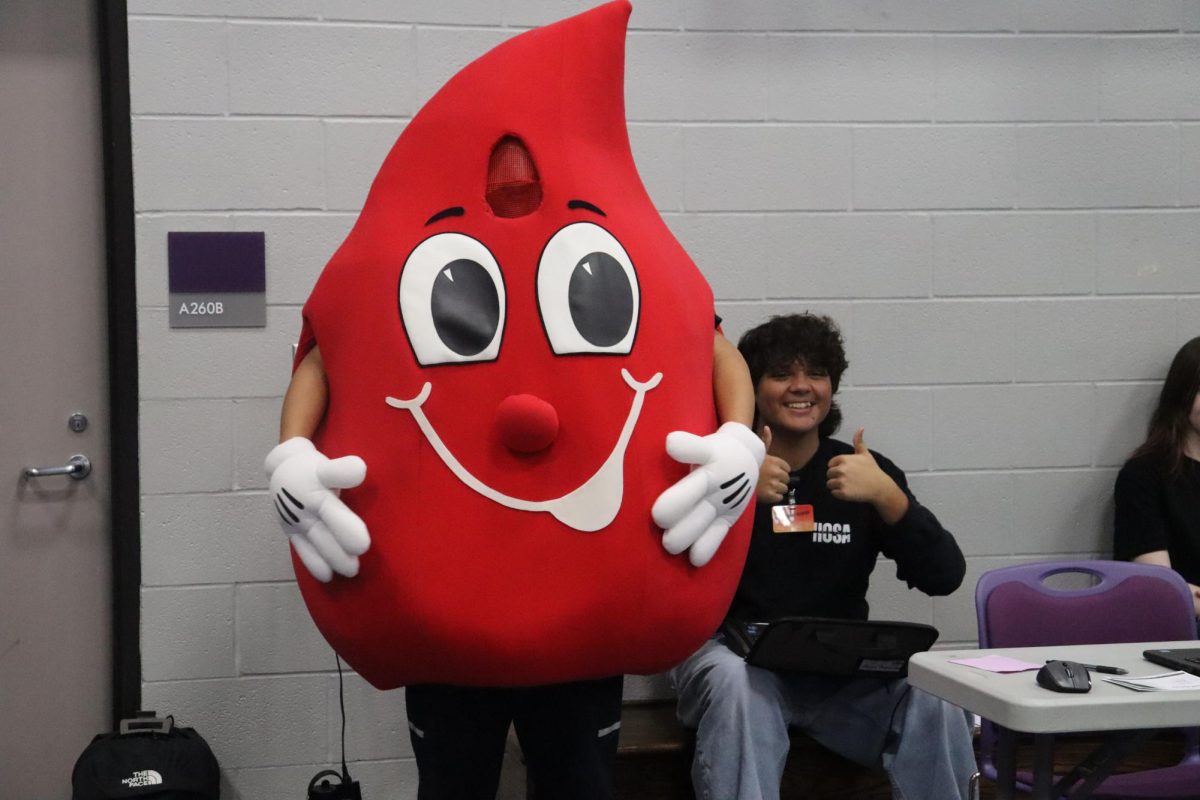 DROP OF LIVE. Entertaining the students working and donating blood, the blood donation mascot, nicknamed Billy the Blood Drop, was present the entire blood drive. Junior Jared Madrid-Williams wore the costume for most of the day.
