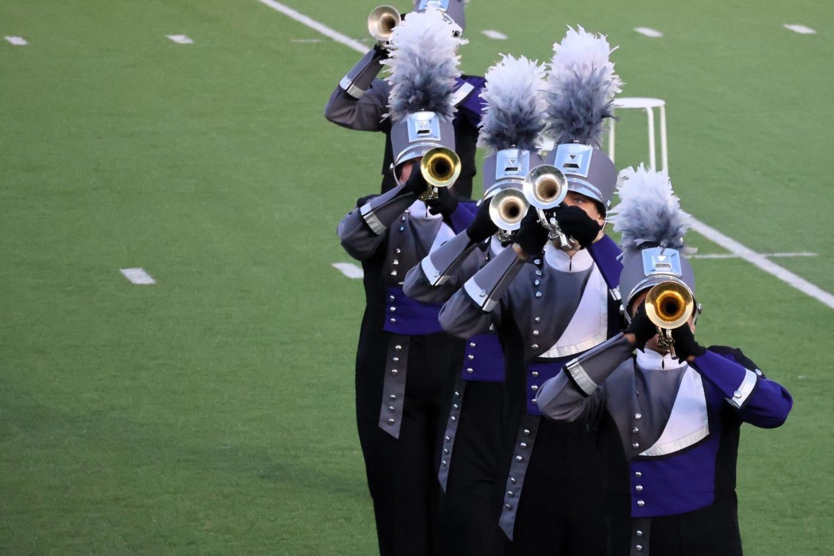 ALL IN A ROW. During the UIL Region 9 contest at Woodforest Bank Stadium in Shenandoah on Tuesday, members of the Wildkat Band trumpet section play part of their show Dimensions of Destiny. The band has one more contest, The Bands of America contest on Nov. 9. photo by Ella McDonald