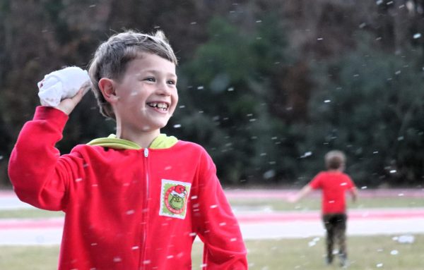 SNO MUCH FUN. At the 2023 Christmas in the Barn, a snow fight was part of the fun.