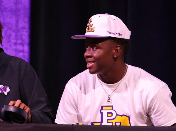 PRAIRIE VIEW BOUND. Ready to be a Prairie View Panther, senior Kelan Harris    signs his letter to play football. On National Signing Day Feb. 8, four other football players signed to play football on the next level. 