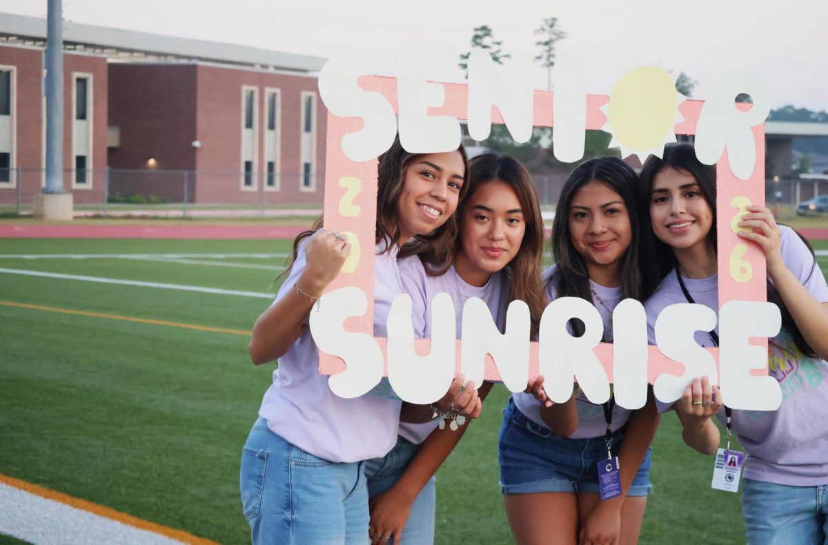 SENIOR SWEETIES. At the senior sunrise on Aug. 15. seniors Ximena Banda, Sofia Cardenas, Rubi Velasco and Jacqueline Galeana take a photo and create a memory of their senior year. Senior Sunrise is a tradition where the seniors gather and watch the sunrise together at Wildkat Field. photo by Yaire Andrade.