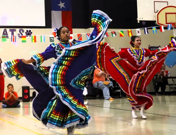  COLORFUL AND GRACEFUL. All dressed up, a group of guest dancers dance the Baile Folklorico to show off their established talents. Many hispanic dance groups made an appearance to C.C Hardy’s Fiesta Night in their traditional dresses.