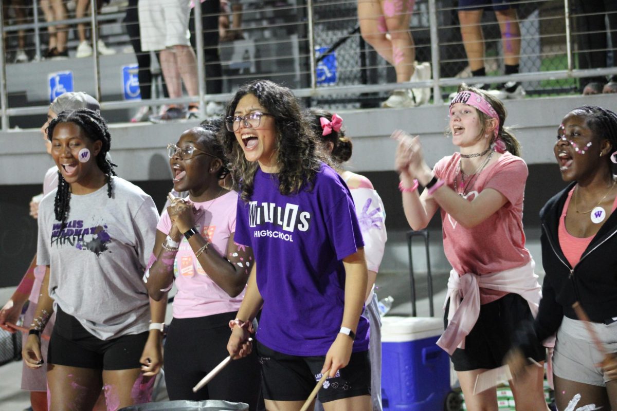 GET LOUD. At last year's game versus New Caney, members of the PitKru make some noise to show their love for the Kats. 