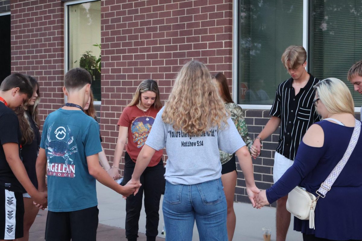 TOGETHER IN CHRIST. Wildkats join in prayer at See You at the Pole 2024. This year's event will be Sept. 24 at 6:20 a.m.