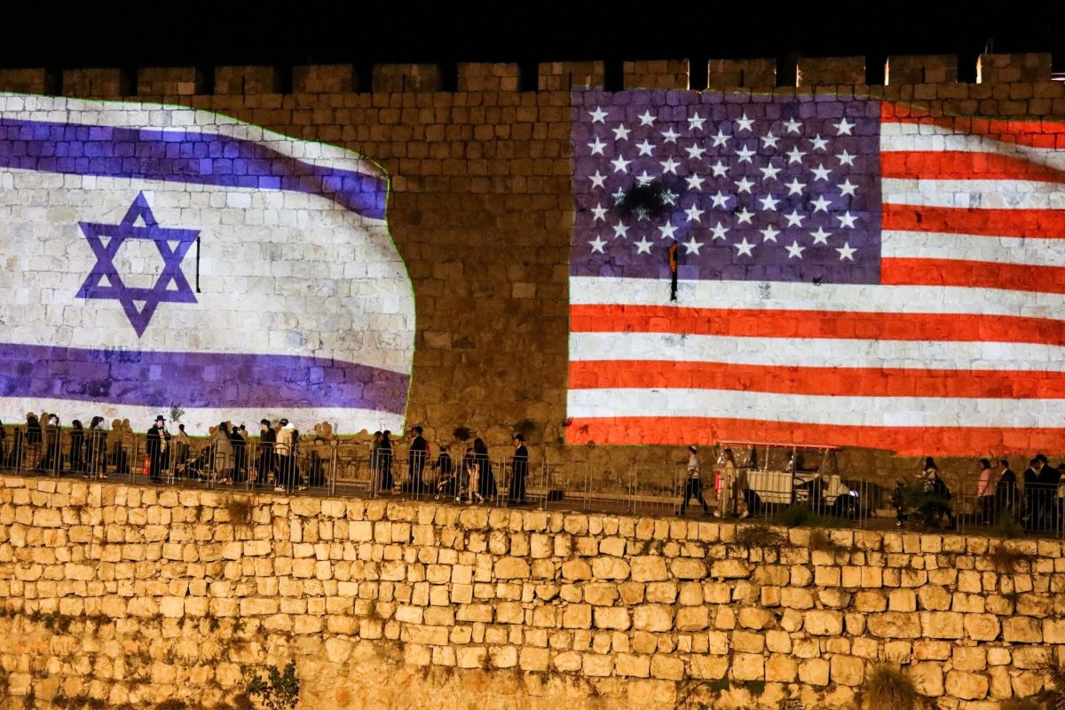 United States and Israel flags are projected on the walls of the Old city of Jerusalem in celebration after Israel and Hamas agreed to the first phase of U.S. President Donald Trump's plan to end the war in Gaza, October 9, 2025. REUTERS/Sinan Abu Mayzer