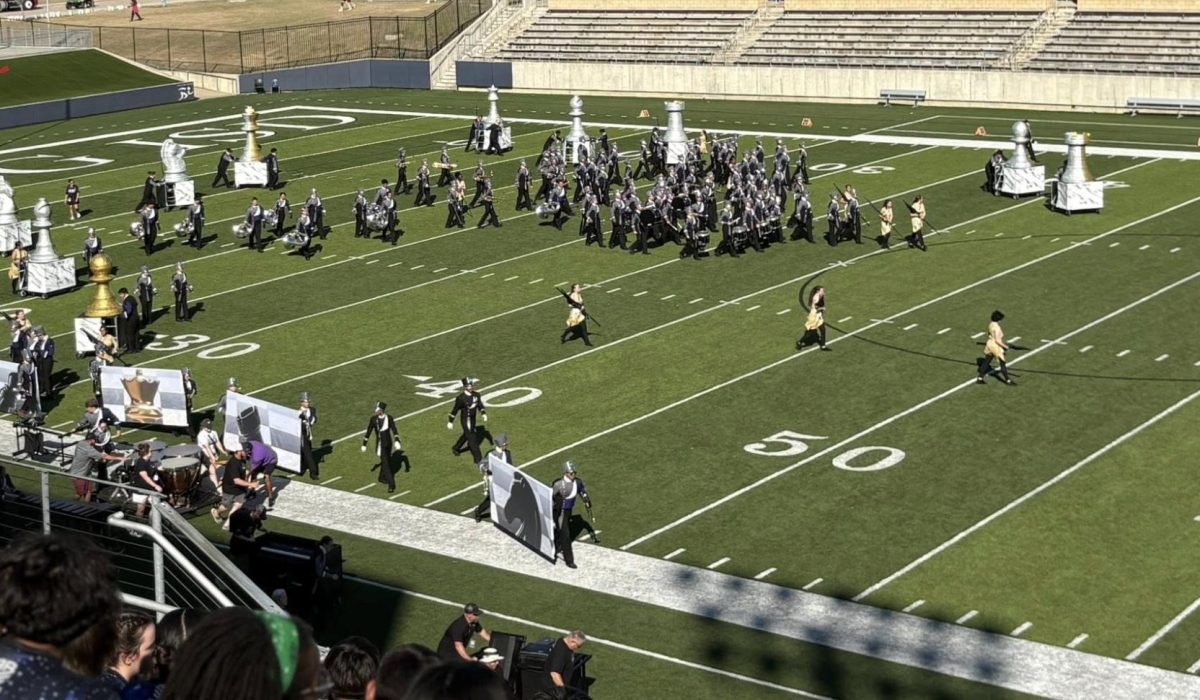 READY TO SHINE. Preparing for their first performance at USb Bands on Saturday, the Wildkat Band takes the field. Their show, What's Your Next Move? placed fourth overall at the contest.