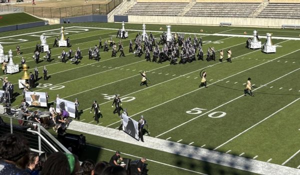 READY TO SHINE. Preparing for their first performance at USb Bands on Saturday, the Wildkat Band takes the field. Their show, What's Your Next Move? placed fourth overall at the contest.
