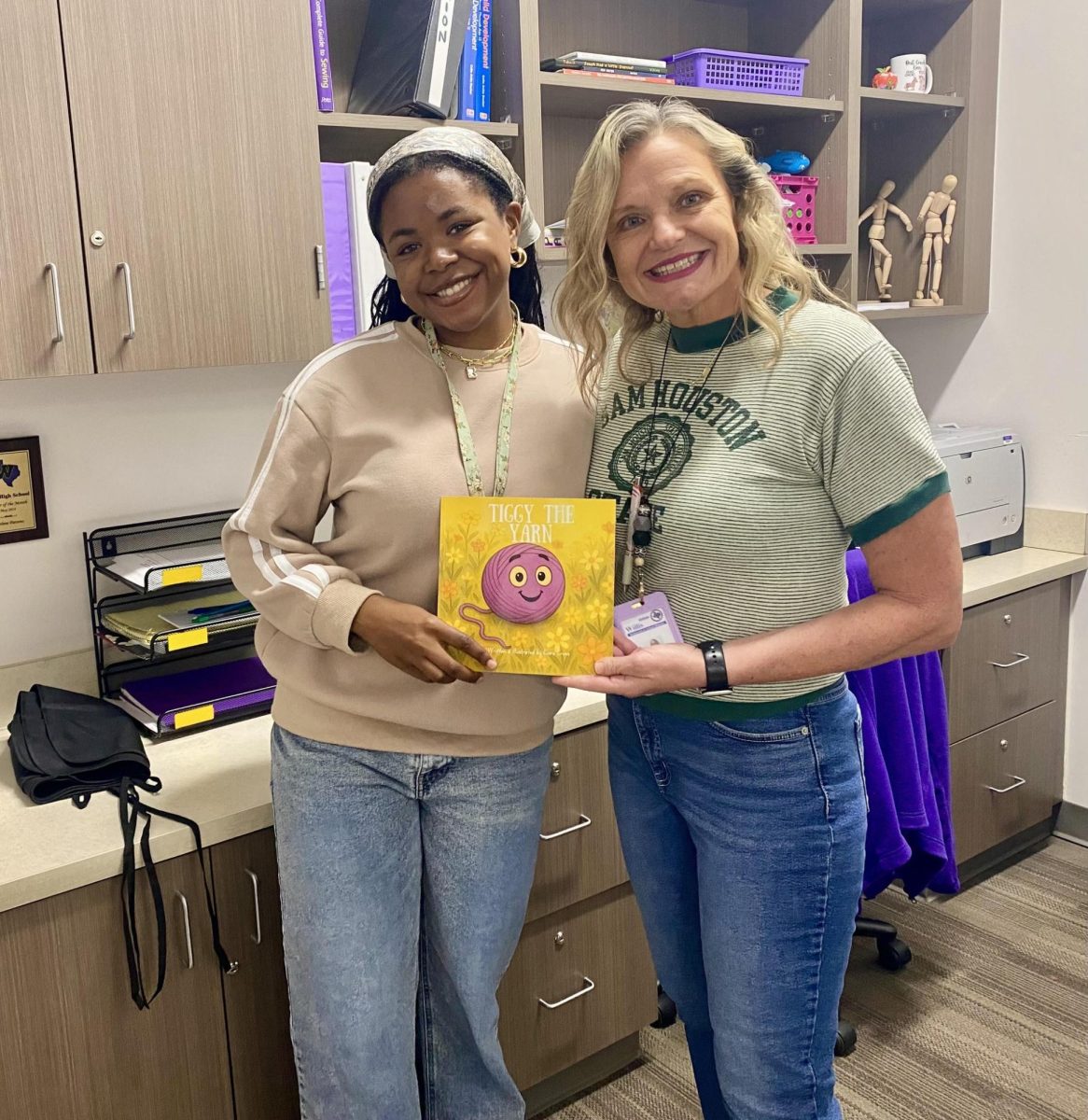 PUBLISHED. Senior Ciara Cross and TAFE sponsor Darlene Parsons show off "Tiggy the Yarn."