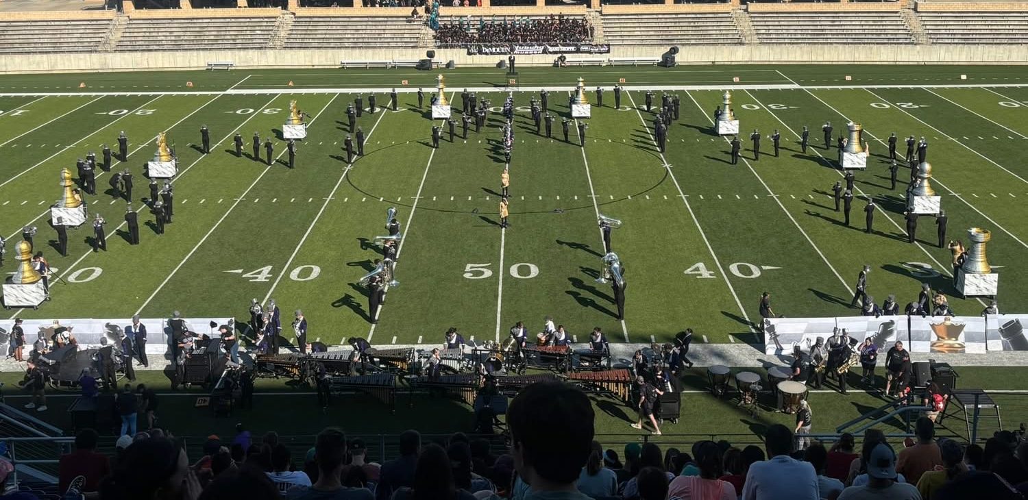 READY TO SHINE. Preparing for their first performance at US Bands on Saturday, the Wildkat Band takes the field. Their show, What's Your Next Move? placed fourth overall at the contest.