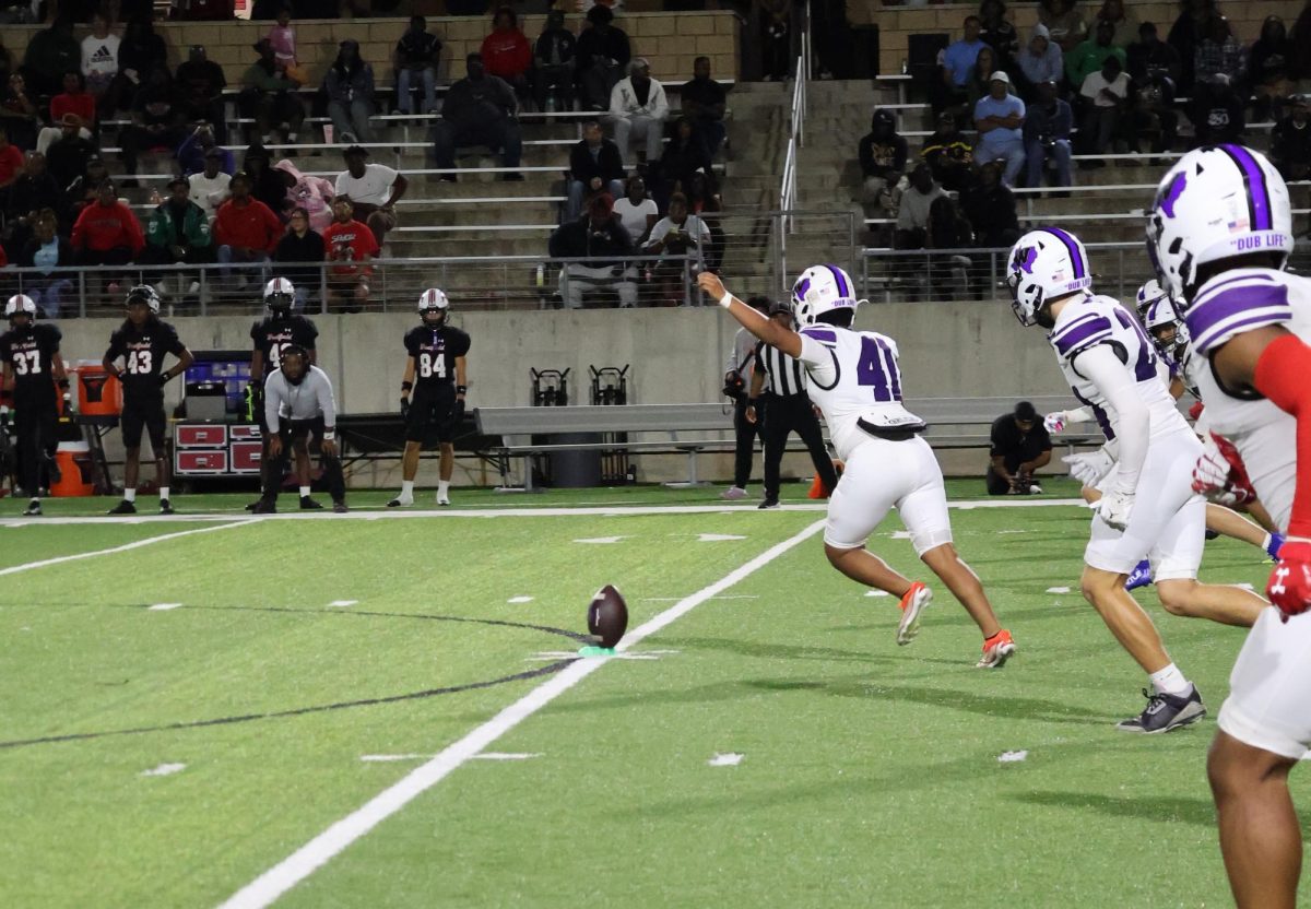TO THE MOON. Kickoff leader senior Eliseo Cantarero starts the second half off strong with a sky high kick to the opponents. Willis started their playoff game strong when they came into the second half with the lead against the Westfield Mustangs. 
