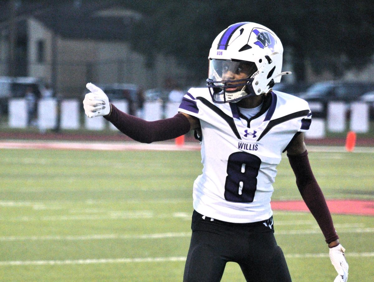 THUMBS UP. Ready for action, sophomore Jamal Lagway waits for the whistle. 