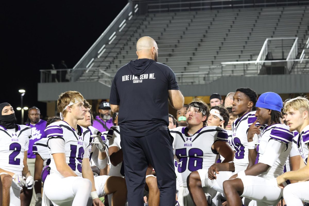 PLAYOFF PREACH. Before the Wildkats face their opponent in round one of the playoffs, head coach Trent Miller gives them a final lecture before taking the field. The Wildkats would then win the game against Spring Westfield, advancing further into the playoffs. 
