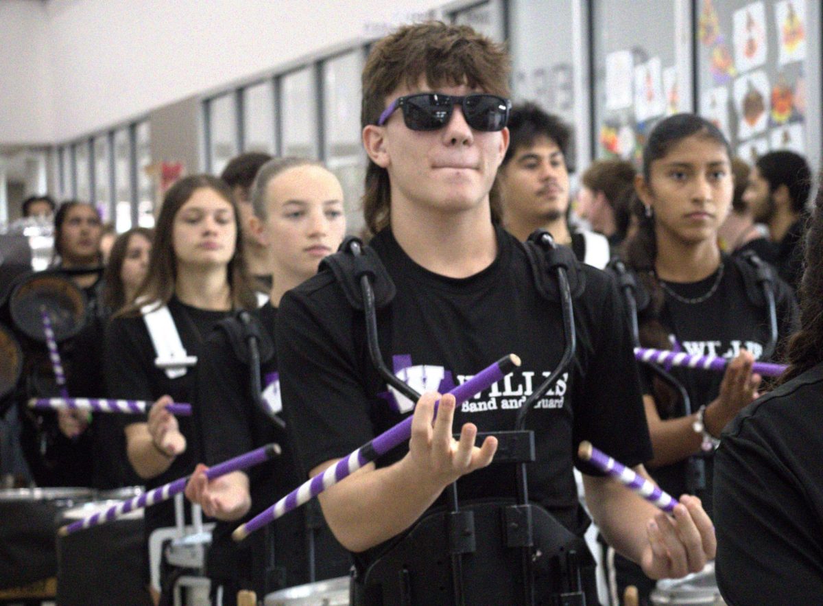 WALK OF CHAMPIONS. Celebrating the groups and teams who have achieved great things this semester, the Walk of Champions included members of the Wildkat Band, student council, varsity football, Wildkat Choir, the PitKats, FFA, Sweethearts, AFJROTC and cheer. 