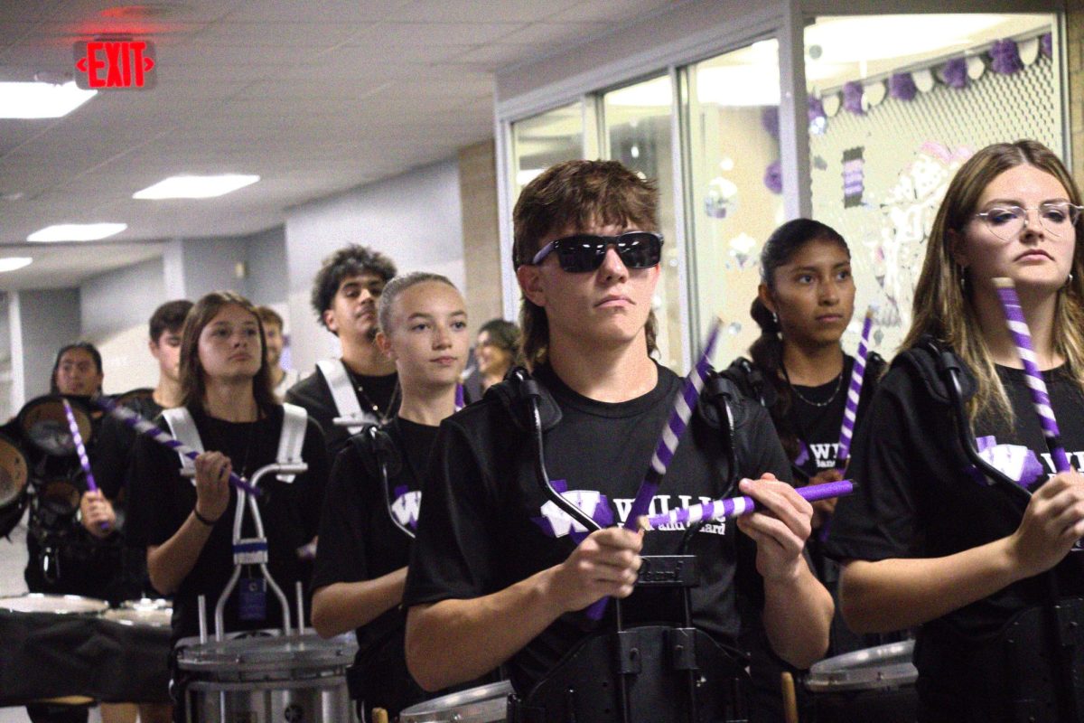 WALK OF CHAMPIONS. Celebrating the groups and teams who have achieved great things this semester, the Walk of Champions included members of the Wildkat Band, student council, varsity football, Wildkat Choir, the PitKats, FFA, Sweethearts, AFJROTC and cheer. 