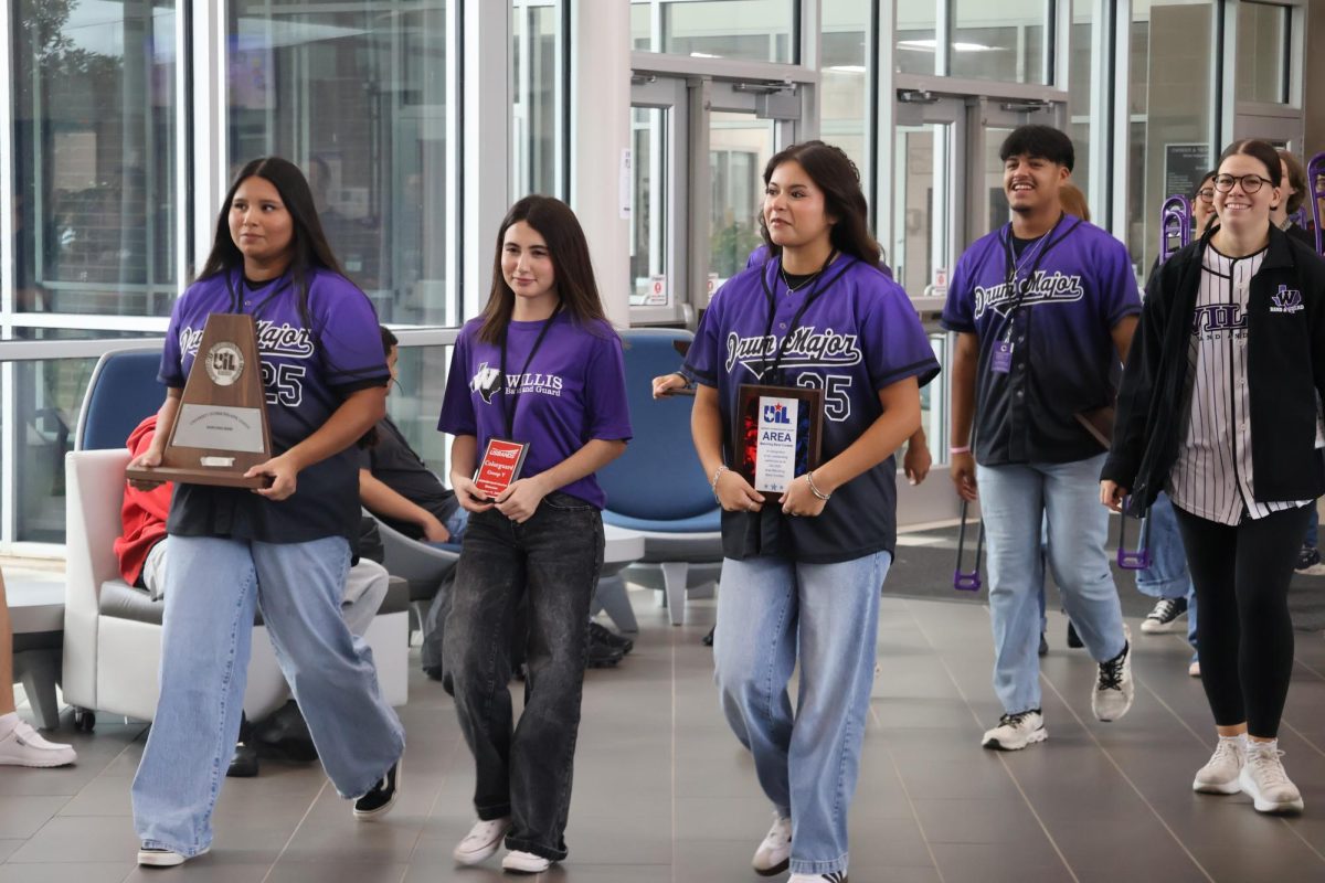 WALK OF CHAMPIONS. Celebrating the groups and teams who have achieved great things this semester, the Walk of Champions included members of the Wildkat Band, student council, varsity football, Wildkat Choir, the PitKats, FFA, Sweethearts, AFJROTC and cheer. 