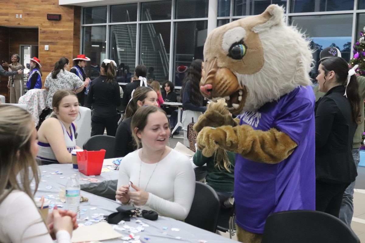 CHRISTMAS IS HERE. Campus organizations welcomed elementary students and their families for the annual Christmas in the Barn on Dec. 5. The vent was full of fun, games, cocoa and Santa Claus. 