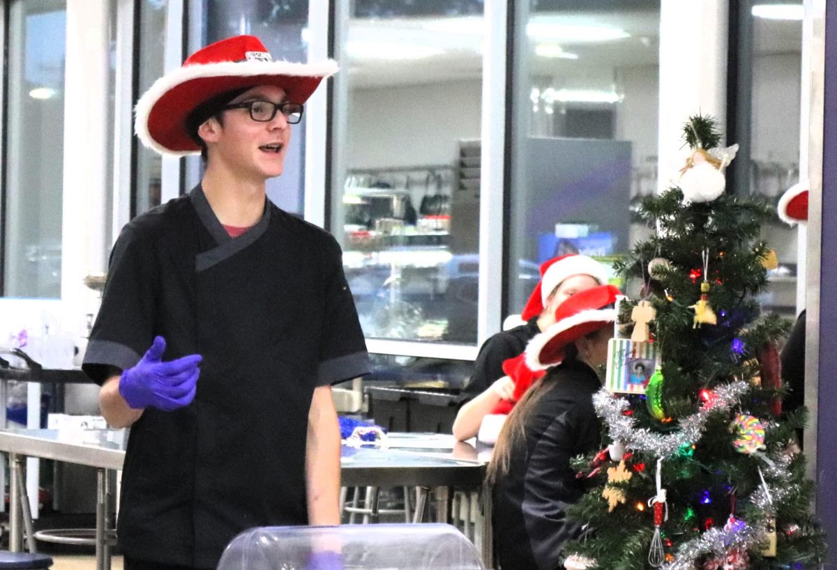 CHRISTMAS IS HERE. Campus organizations welcomed elementary students and their families for the annual Christmas in the Barn on Dec. 5. The vent was full of fun, games, cocoa and Santa Claus. 