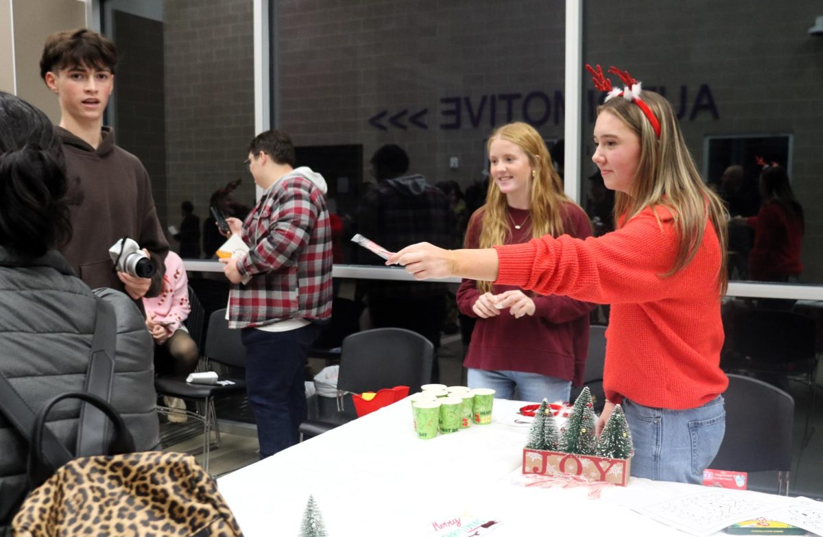 CHRISTMAS IS HERE. Campus organizations welcomed elementary students and their families for the annual Christmas in the Barn on Dec. 5. The vent was full of fun, games, cocoa and Santa Claus. 