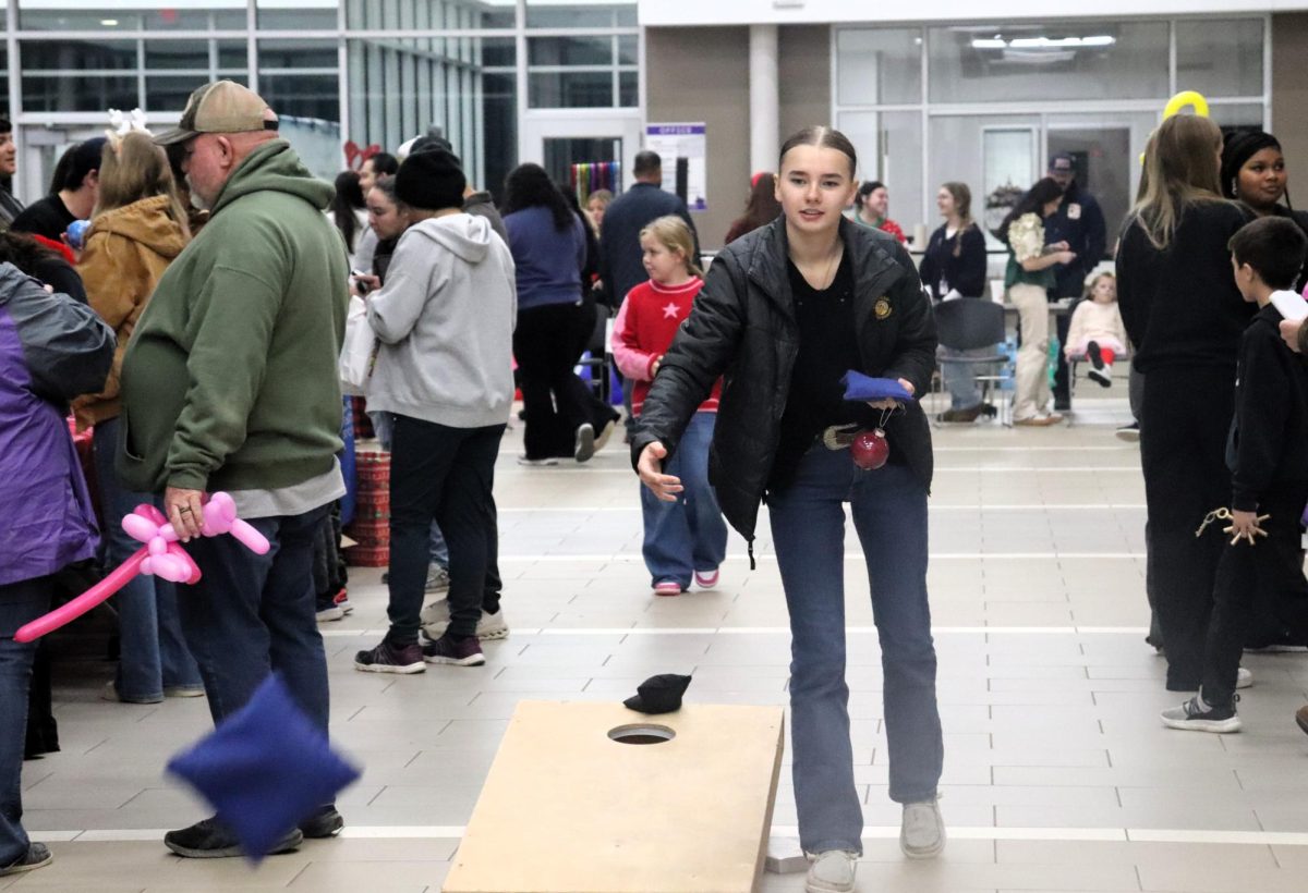 CHRISTMAS IS HERE. Campus organizations welcomed elementary students and their families for the annual Christmas in the Barn on Dec. 5. The vent was full of fun, games, cocoa and Santa Claus. 