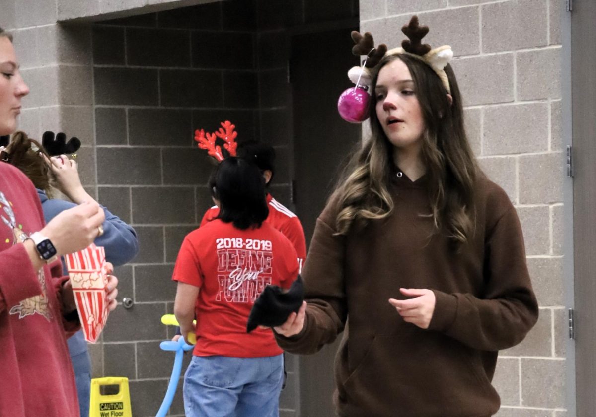 CHRISTMAS IS HERE. Campus organizations welcomed elementary students and their families for the annual Christmas in the Barn on Dec. 5. The vent was full of fun, games, cocoa and Santa Claus. 