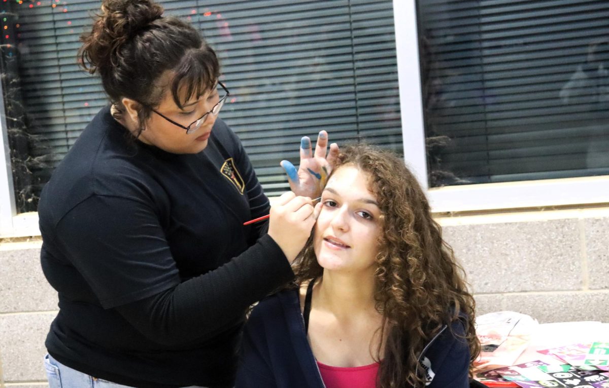 CHRISTMAS IS HERE. Campus organizations welcomed elementary students and their families for the annual Christmas in the Barn on Dec. 5. The vent was full of fun, games, cocoa and Santa Claus. 