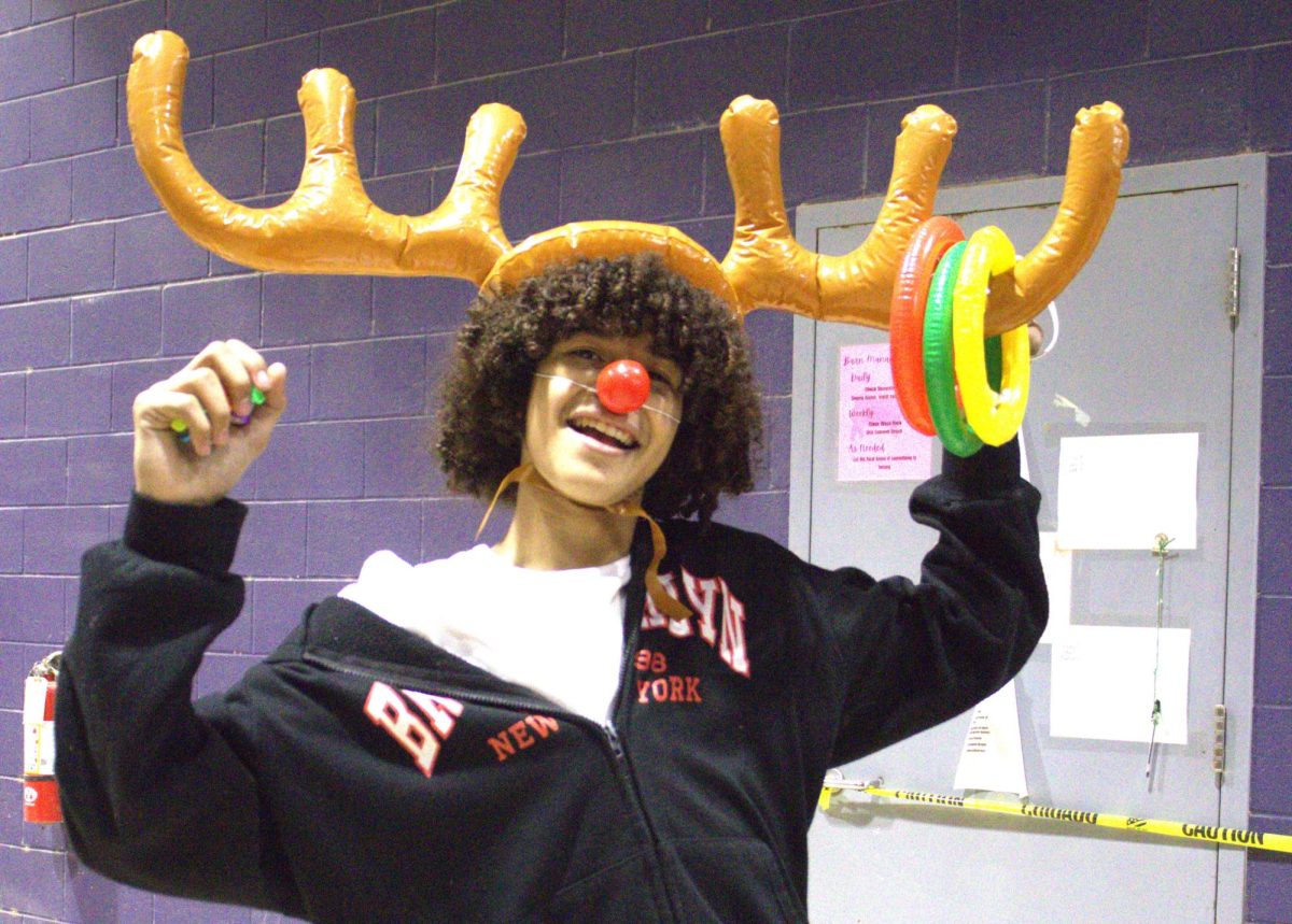 CHRISTMAS IS HERE. Campus organizations welcomed elementary students and their families for the annual Christmas in the Barn on Dec. 5. The vent was full of fun, games, cocoa and Santa Claus. 