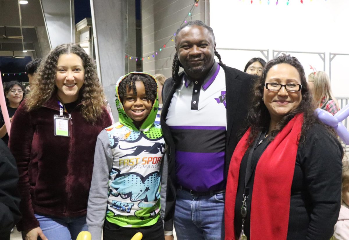 CHRISTMAS IS HERE. Campus organizations welcomed elementary students and their families for the annual Christmas in the Barn on Dec. 5. The vent was full of fun, games, cocoa and Santa Claus. 