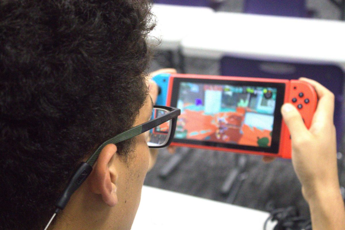 MARIO CART MADNESS. On his Nintendo Switch senior Fabio Baldovinos plays Mario Cart during an Esport meeting. 