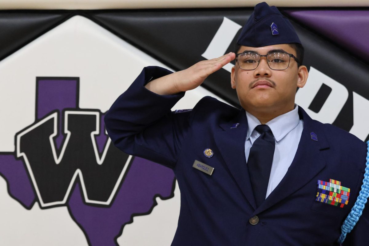 SALUTING THE WINNERS. This photo by senior Hailee Henry of senior Jhun Abarquez was just one of many photos chosen by TAJE as winners in the Best In  Texas awards. 