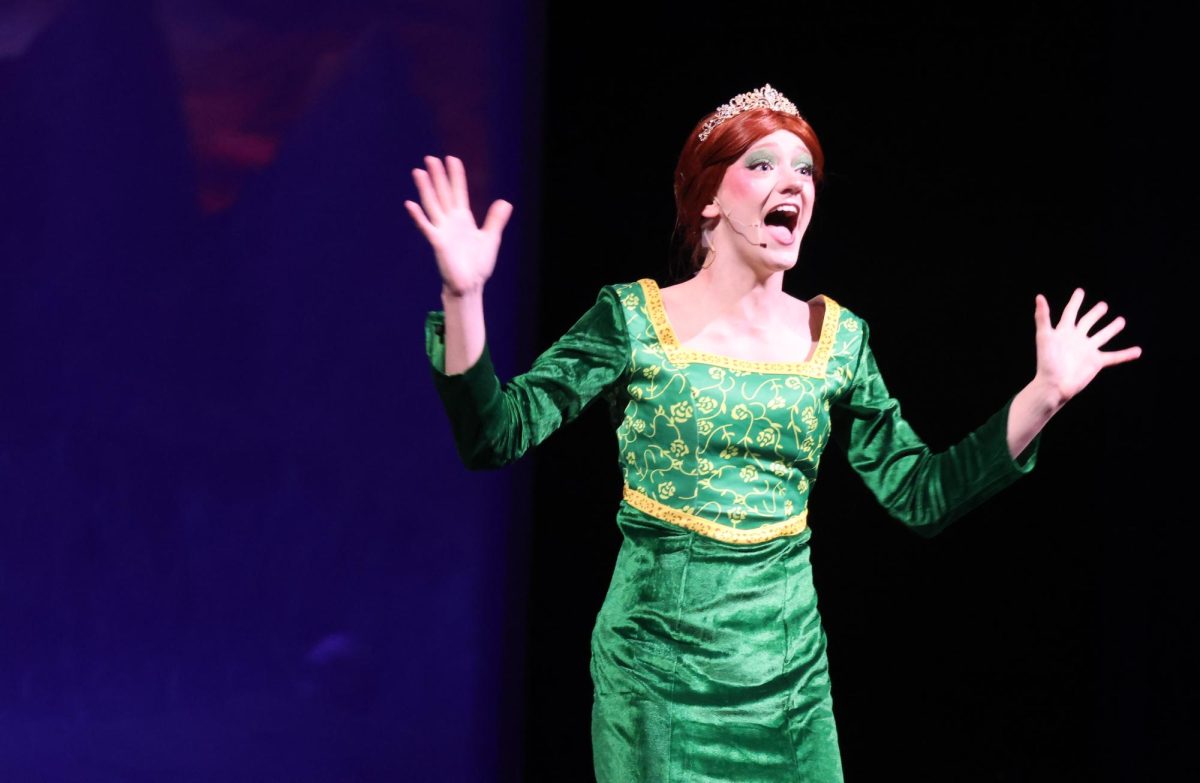 TODAY IS THE DAY. Fiona (sophomore Sophia Von Koschembahr) is elated when she sings about the day her prince will rescue her. 