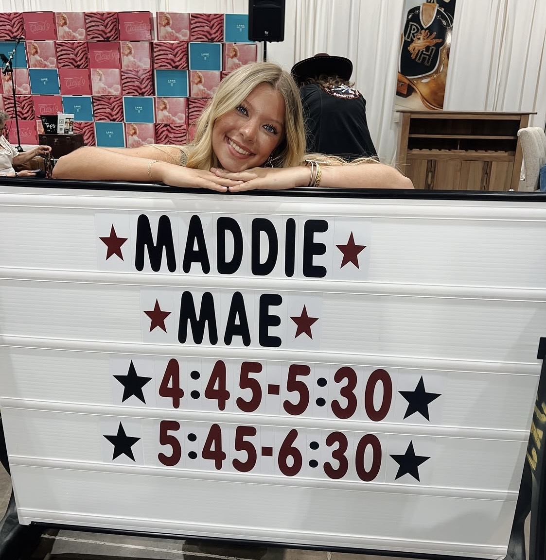 ON STAGE NOW. Before her performance at the Houston Livestock and Rodeo, senior Maddie Mae Bratton shows off her showtimes. 