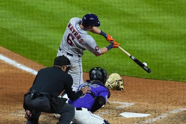 Apr 6, 2026; Denver, Colorado, USA; Houston Astros center fielder Jake Meyers (6) doubles in the eighth inning against the Colorado Rockies at Coors Field. Mandatory Credit: Ron Chenoy-Imagn Images