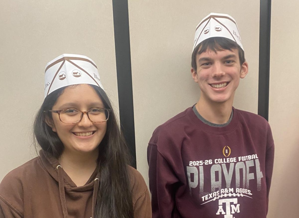 WE ALL SCREAM FOR ICE CREAM. In the elevator at Blue Bell Creamery, juniors Isabella Zavala and Ryder Sciba enjoy the first day of the ILPC road trip. A group of Wildkat Media students travelled to Austin for the media conference. 