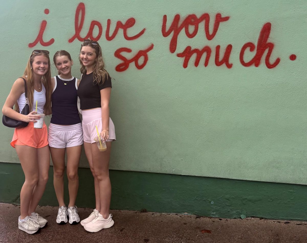 ICONIC. The mural of the wall of Jo's Coffee Shiop on South Congress is the perfect backdrop for juniors Braelynn Wheeler, Finley McDonald and Ashtyn King. The group spent time in SoCo before leaving the capitol city.