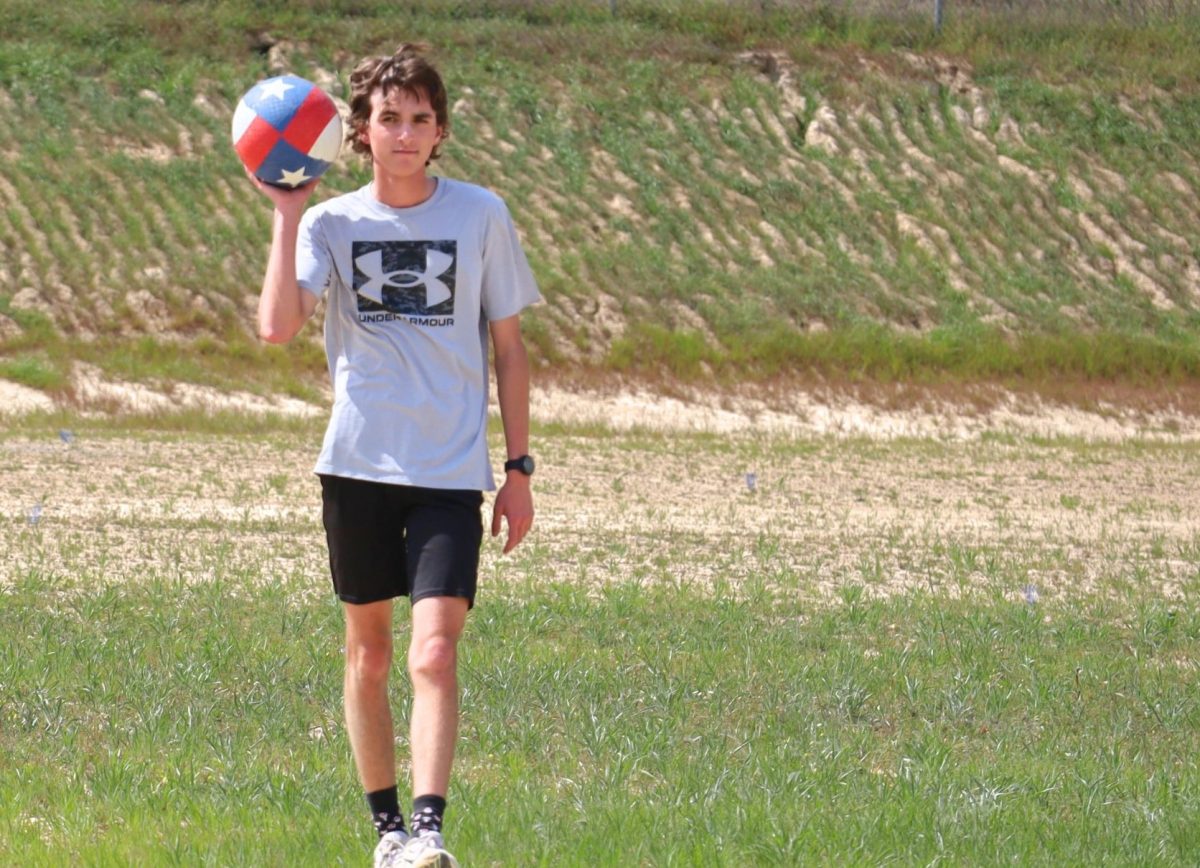 READY TO BATTLE. At the FFA kickball game, senior Porter Beakley readies for action. The game was part of the March meeting held Tuesday. 