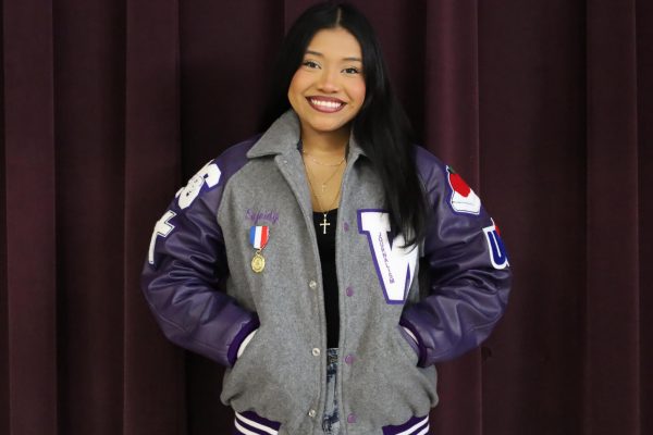FOR THEM. With her letterman earned because of her contribution to Wildkat Media, senior Sujeidy Ortiz shows off her newest accolade - a first place medal from ILPC.